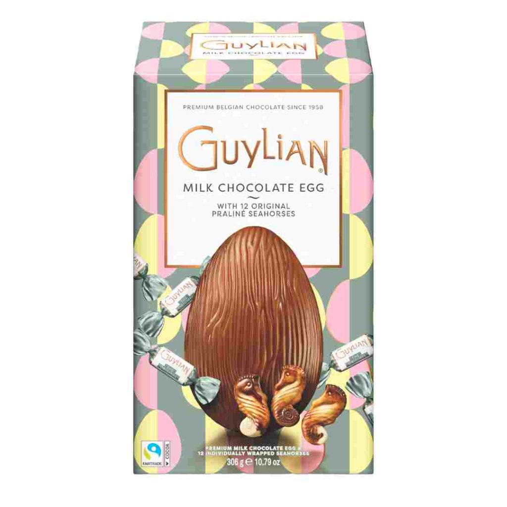 Guylian milk chocolate egg in its package with Belgian seashell chocolates