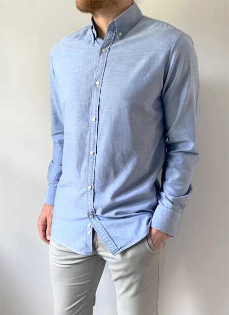 Model wearing an Arthur and Henry Oxford blue shirt