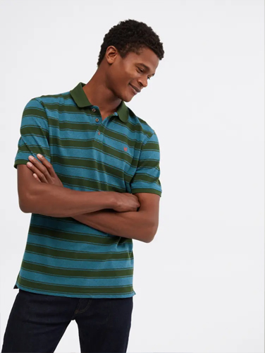 Model wearing White Stuff Lewes stripe polo