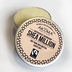 A small round tin of Akoma Fairtrade Shea Million butter