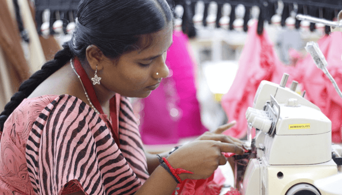 Armstrong Knitting Mills - Producer at sewing machine