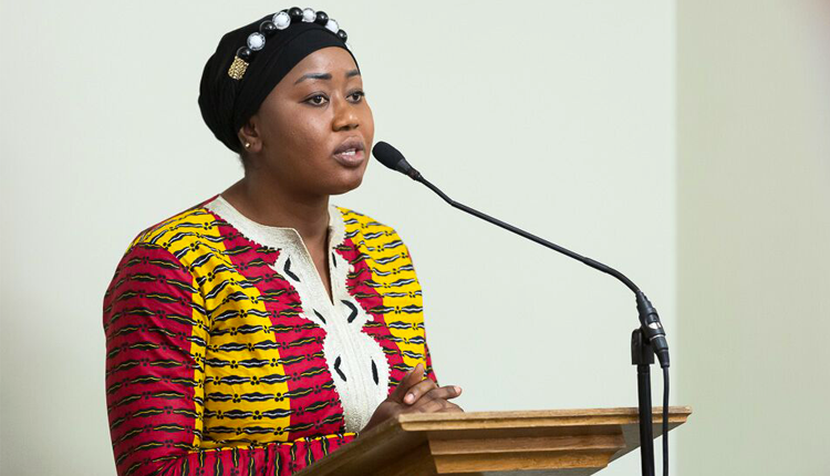 Awa Traore making a speech on living income for cocoa farmers in Parliament