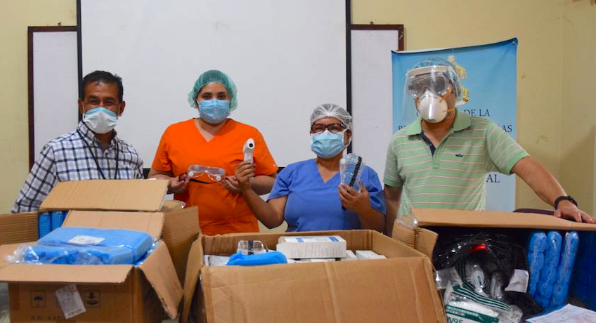 Members of COMSA coffee co-operative in Honduras donated biosafety equipment to local healthcare workers