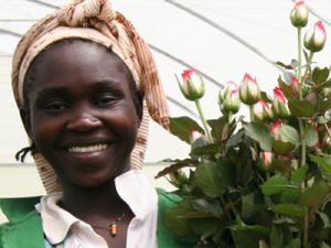 Woman in flower greenhouse