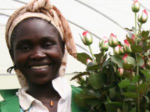 Woman in flower greenhouse