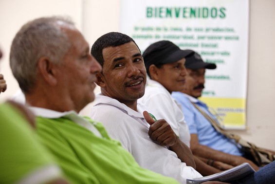 Foncho, banana farmer, sitting in a meeting