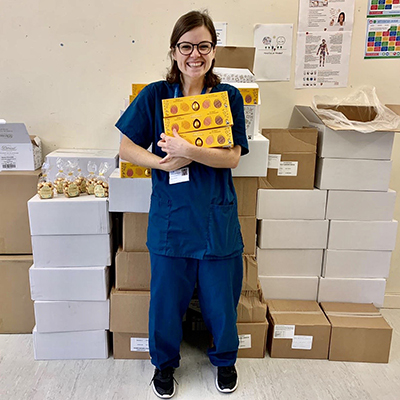 Lewisham hospital nurse holding Divine easter eggs.