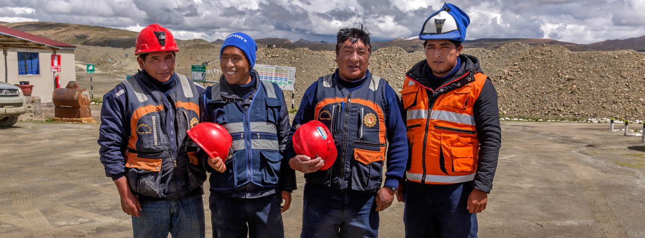 Four gold miners in Peru