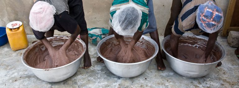 Fairtrade producers mixing shea