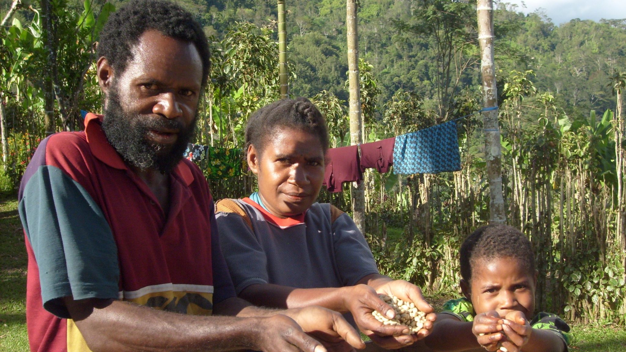 Cooperative member Tekembi and family. Neknasi Coffee Growers