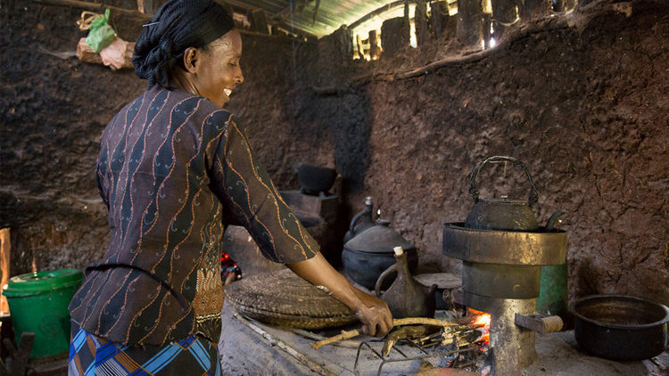 Mulane Jabessa, OCFCU, using her cookstove