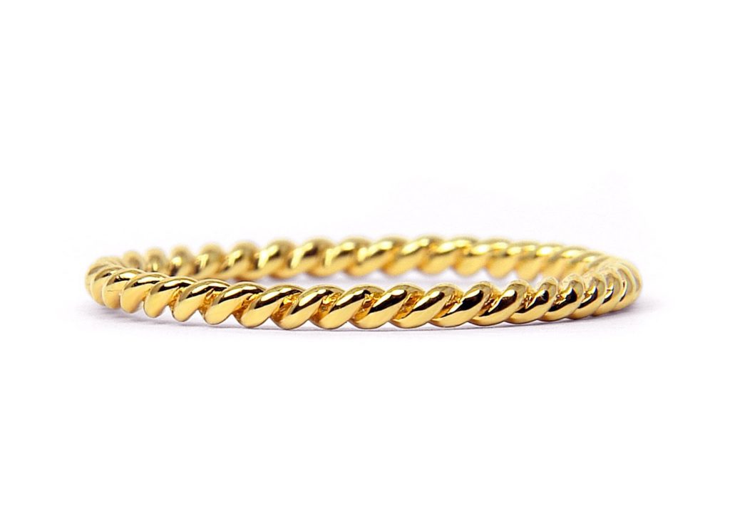 A Fairtrade yellow gold braided ring