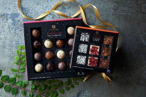Festive photo of Co-op's Irresistible range boxes of Fairtrade chocolate