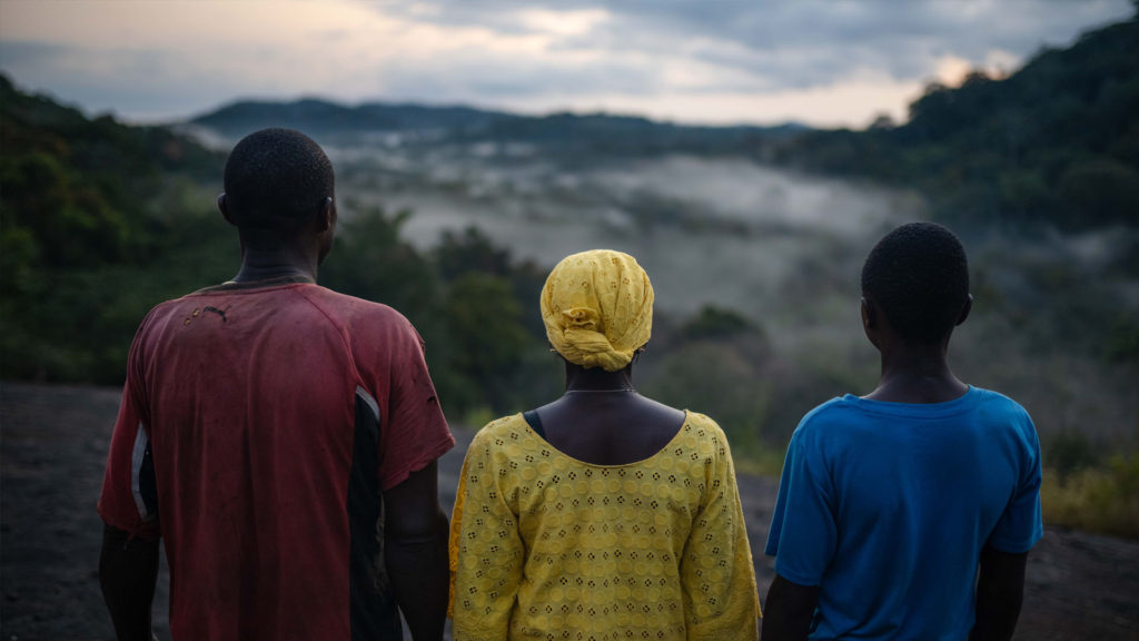 Lucia Mansaray, Sidie Sesay and Beshey looking out over the Gola Rainforest