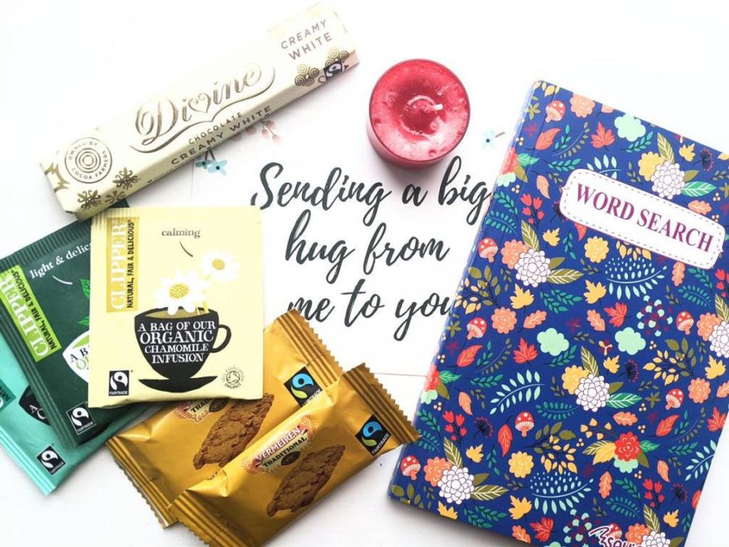 A pretty puzzle book, wrapped fairtrade tea bags and biscuits