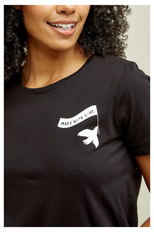 Close up of a black t-shirt showing a white "made with love" message
