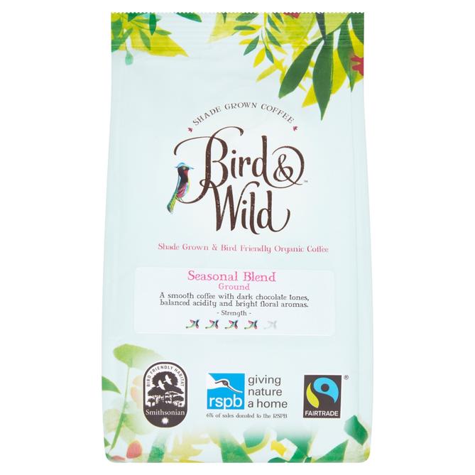 A packet of Bird & Wild organic coffee, pale blue packet with green leaves illustrated on it