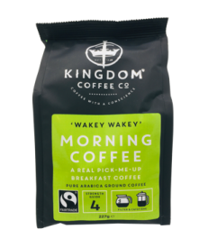 A packet of Kindom Coffee Morning Coffee, plack packet with bright green lable.