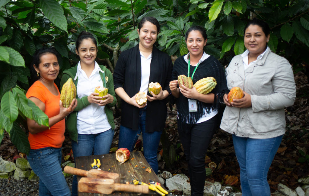 Rosa Maribel Cortes, Julibee Portillo, Alejandra Lemus, Julissa Medina y Sandra Buezo. All work at the Xol chocolate factory in Honduras. Xol chocolate is a brand of the Fairtrade-certified COAGRICSAL coop.