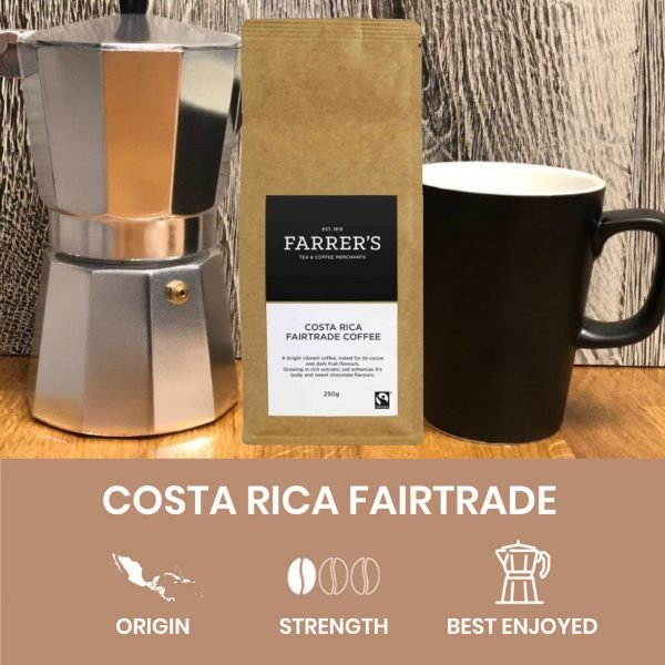 An espresso coffee maker with a cup and pack of Farrer's fairtrade coffee