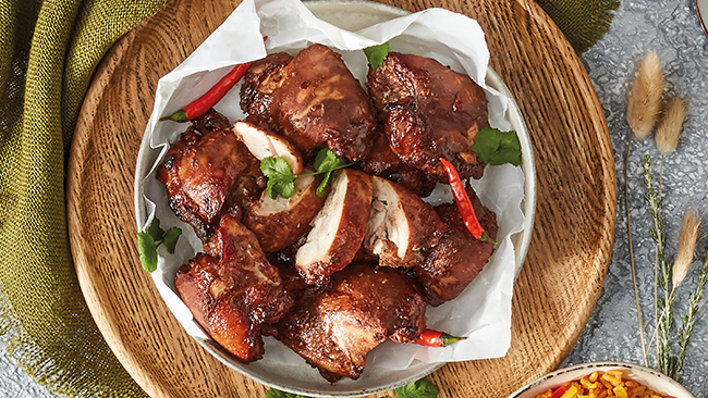 slices of barbecued chicken coated in chocolate