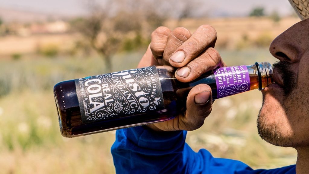 Portrait of a man drinking Gusto Organic Real Cola