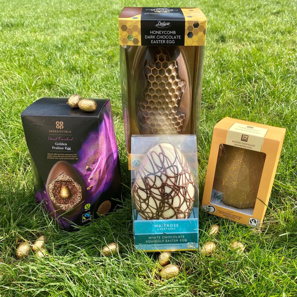 Four Fairtrade Easter eggs on the grass