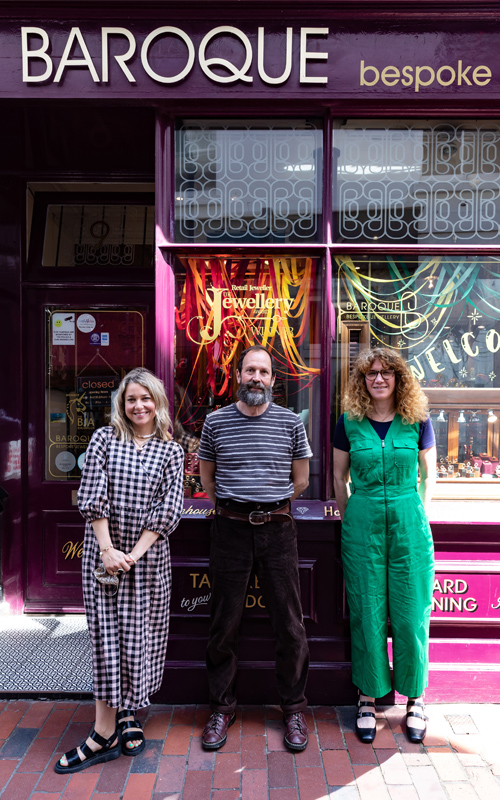 Zoe de Pass with Jason French and Pippa Knowles owners of Baroque, standing outside of Baroque's shop in Brighton