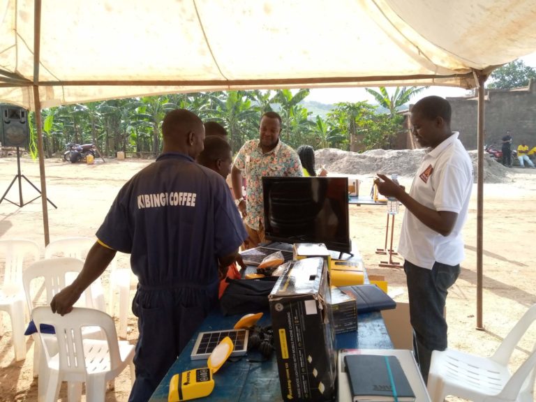 Solar Energy Product Supplier Anuel Energy Presents Their Services to Farmers at Kibinge Coffee Farmers Cooperative Society (KCFCS). Photo Credit: Practical Action