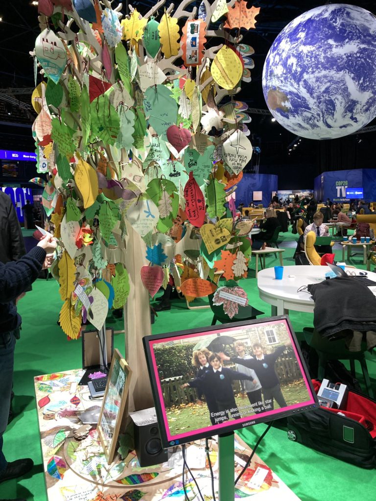The tree of promises with hand-written messages at COP26 