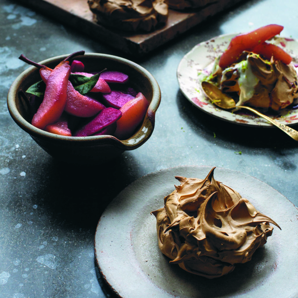 delicious looking brown sugar meringues on a plate with a bowl of cooked fruit