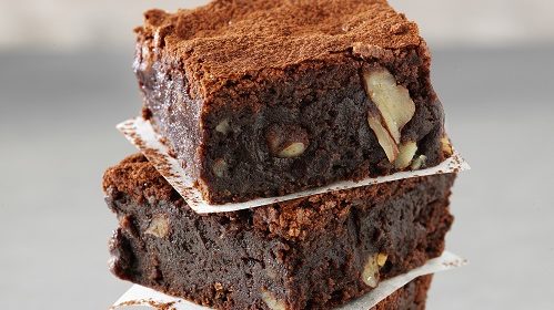 gooey chocolate brownies piled on top of each other