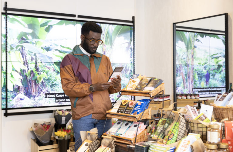 Man shopping at he Endangered Aisle for Fairtrade Fortnight 2023